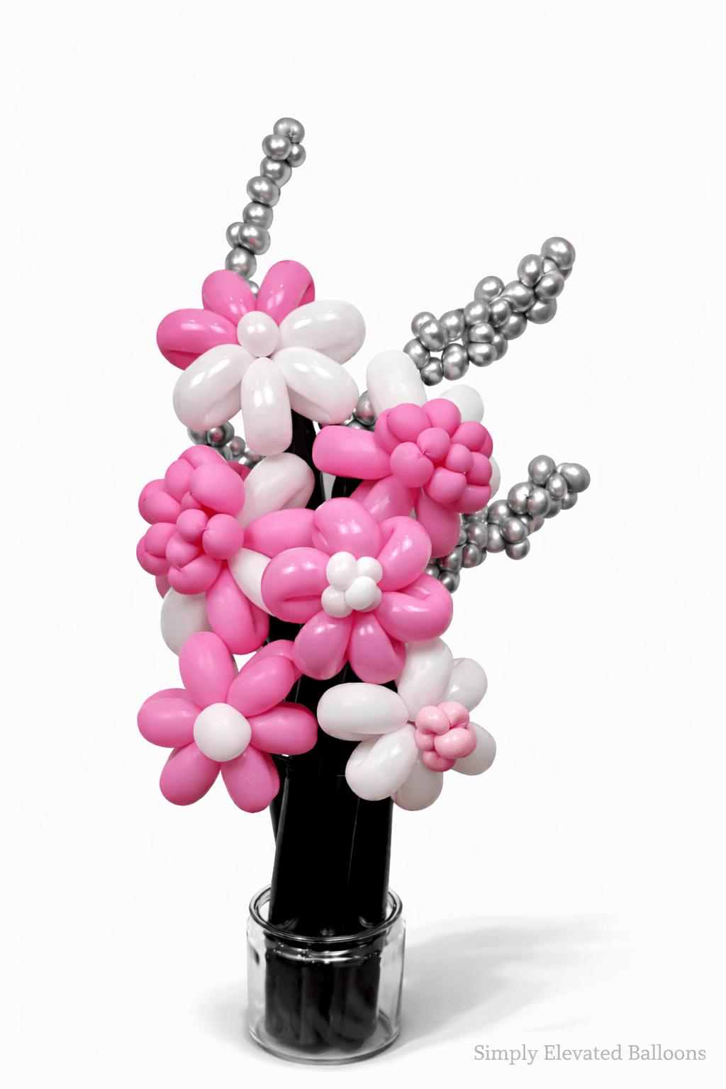 Pink and white balloon bouquet by Simply Elevated Balloons