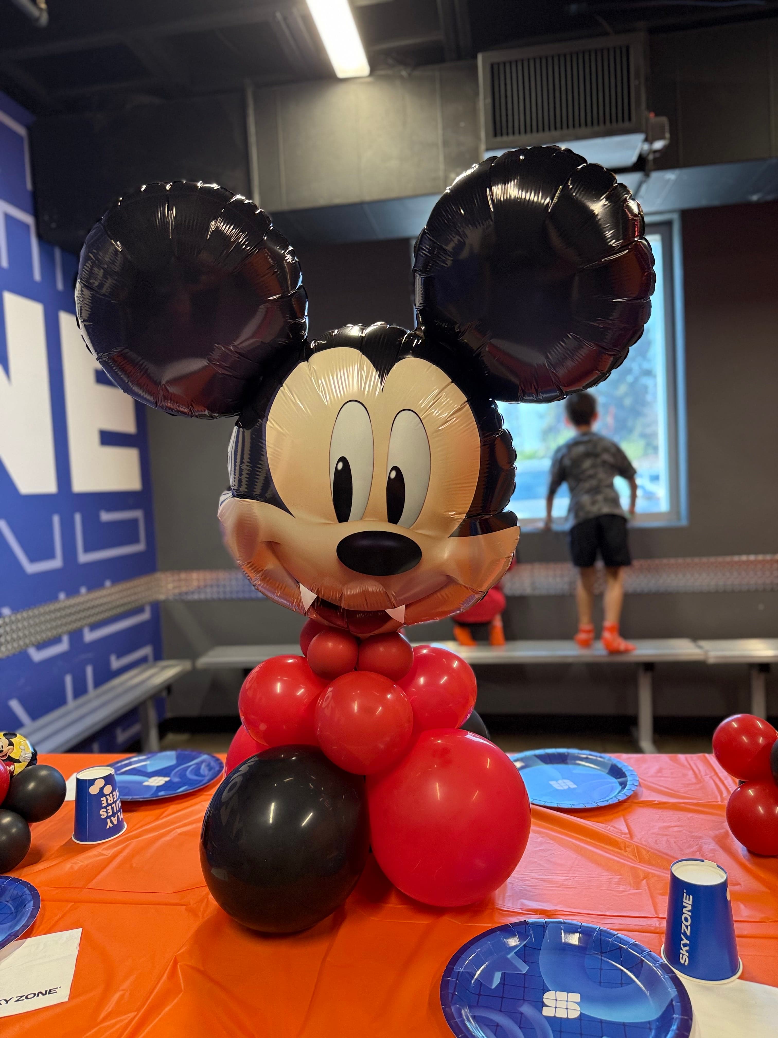 Themed balloon stack with licensed character foils by Simply Elevated Balloons